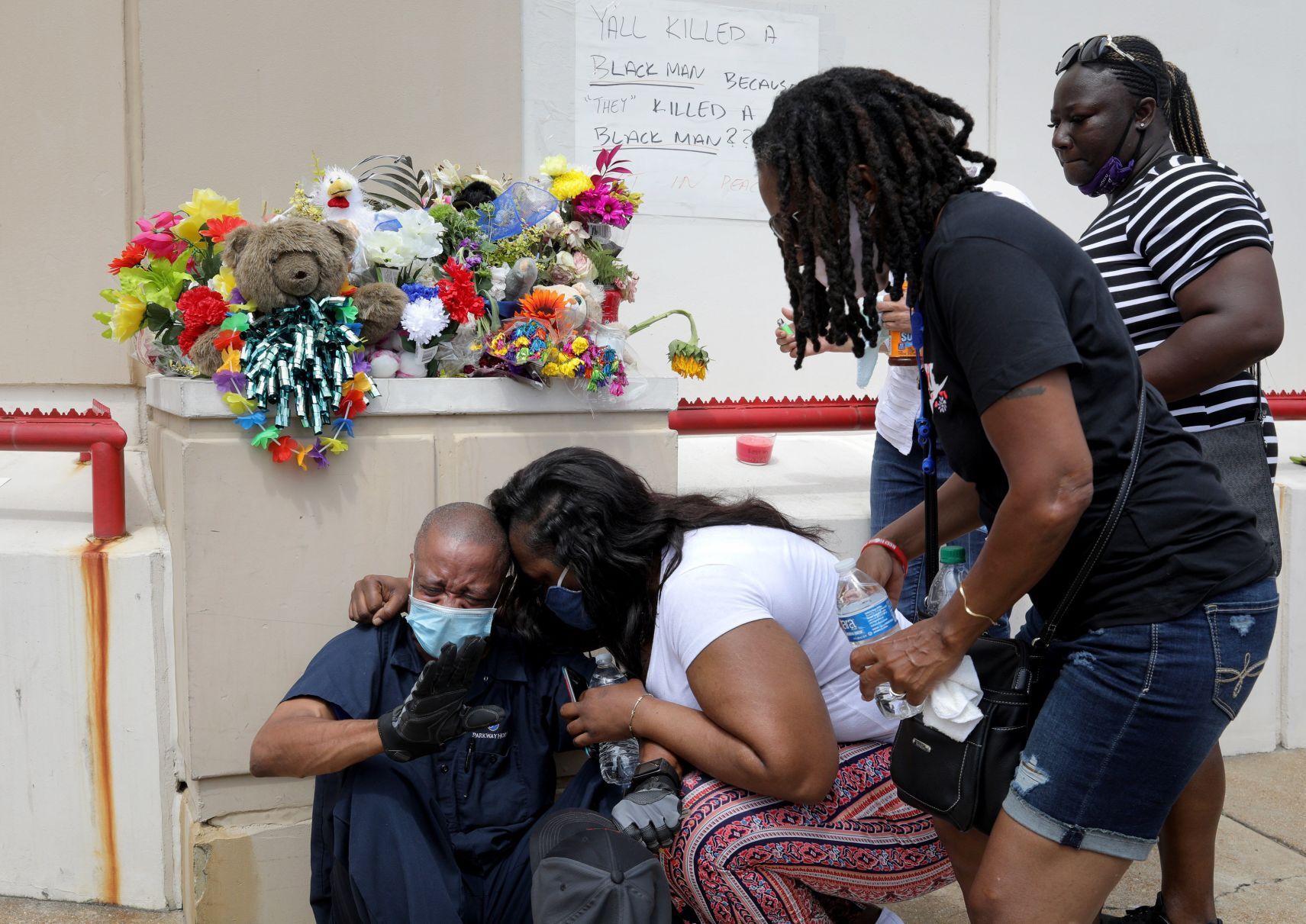 Loved ones remember David Dorn outside Lee's Pawn